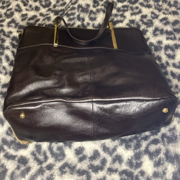 👜 Wilson’s Leather 👜
Cow print bag 🤠 
{new + unused} 
mint condition. - Picture 6 of 6